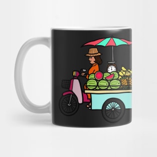 Street food motorcycle selling tropical fresh fruit, Thailand. Mug